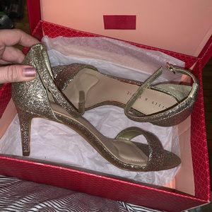 Worn once. Very comfortable, gold heels